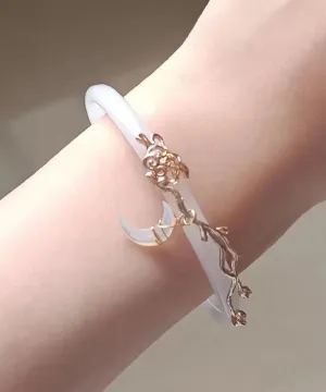 Elegant White Alloy Coloured Glaze Moon Bangle QJ031